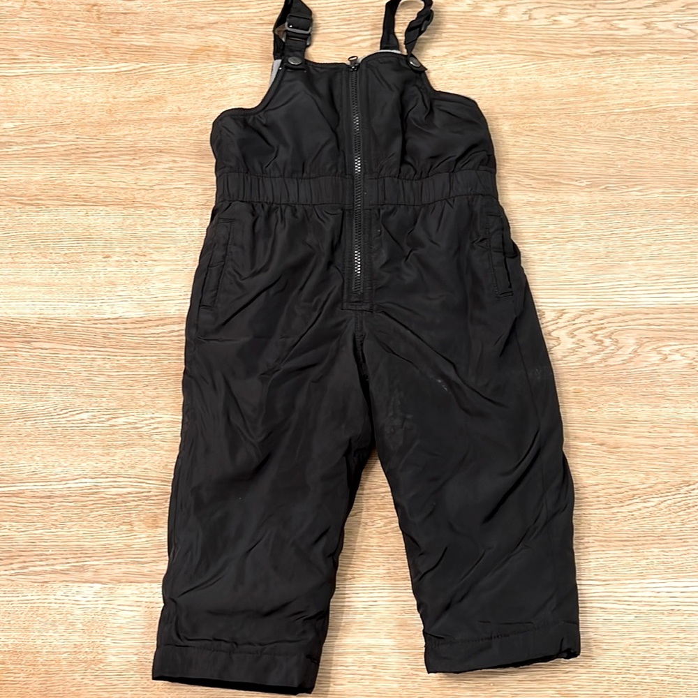 Black toddler 2T overall snowsuit, adjustable straps and boot closure.